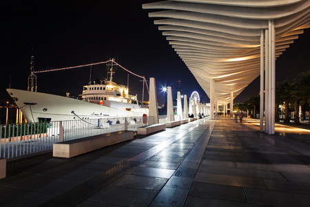 Night view of promenade in Malaga, Spain.の写真素材