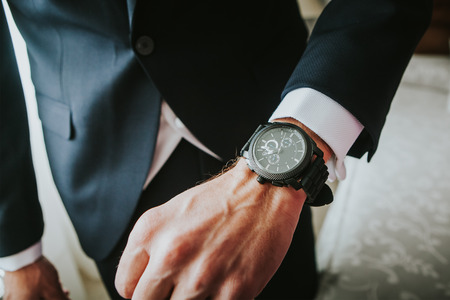 Brand new luxury watch in a man wrist. Business. Brand new luxury watch in a man wrist. Business.