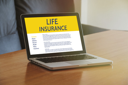 Life Insurance concept: Laptop computer with Life Insurance contract in the screen.の写真素材