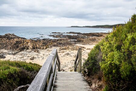 Wooden runway to access to the beach.の写真素材