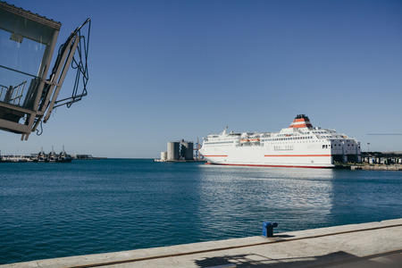 Big cruiser floating in the sea at the port.の写真素材