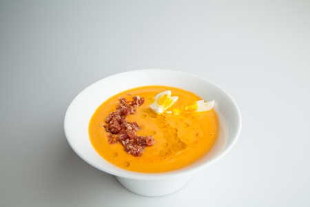 Salmorejo is an Andalusian smooth soup made with tomato, bread and olive oil.の写真素材