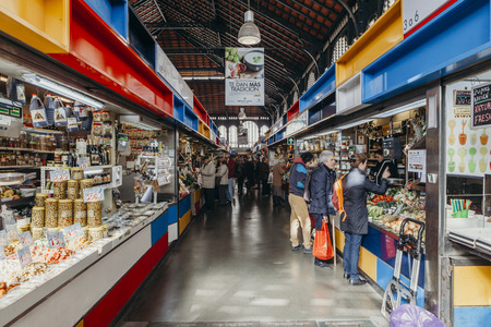 Malaga, Spain - December 5th, 2017: Interior corridor view of Atarazanas Market with people buying in the shops inside it, in Malaga, Spain, on December 5th, 2017.のeditorial素材
