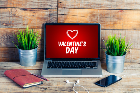 Valentine's day shopping website in a laptop screen.の写真素材