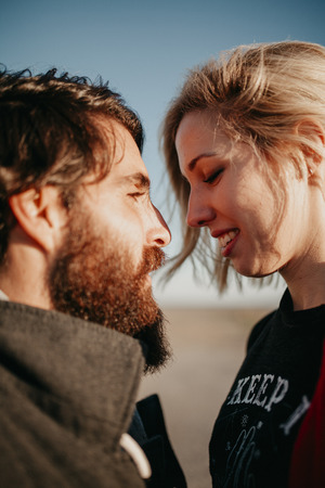 Cool couple enjoying together outdoors in the city suburbs.の写真素材