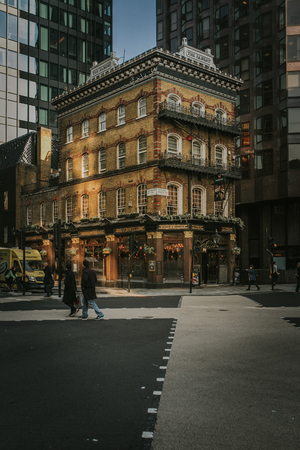 LONDON, ENGLAND - October 25th, 2018: Traditional building facade of Albert Pub in Westminster area, settled between new modern buildings, in a sunny day, in London, England.のeditorial素材