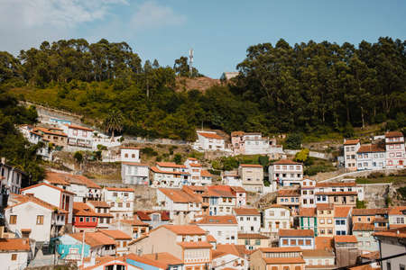 Cudillero, Spain - August 25th, 2020: Cityscape of Cudillero village, in the north of Spain. Cudillero is a charming village in Asturias, placed on a hill of the Atlantic coastline, with picturesque architecture and touristic restaurants and cornersのeditorial素材