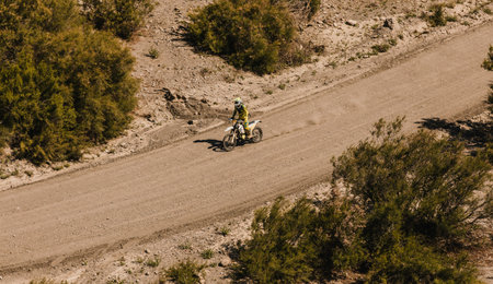 Almeria, Spain - May 5th 2021: Motocross rider riding in nature during Dunlop Xperience showroom and...