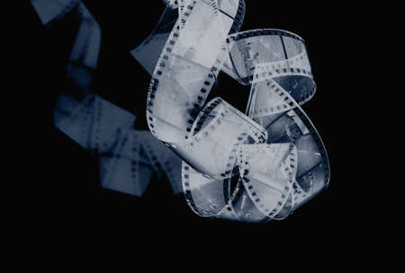 curly black and white film and shadowの写真素材