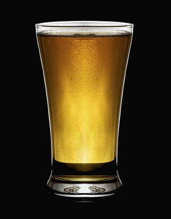  a cool glas of beer  with a balck backgroundの写真素材