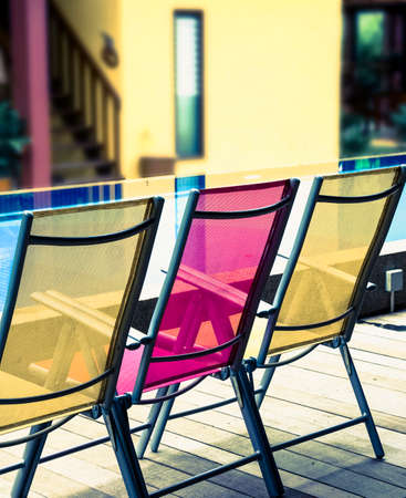 color   deckchairs,  by the poolの写真素材