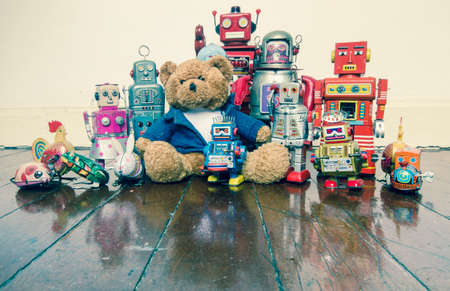 old teddy bear with his toysの写真素材