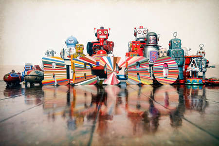 vintage toys on a wooden floor with reflectionの写真素材