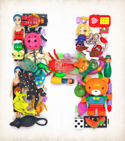 the letter   H made from small toysの写真素材