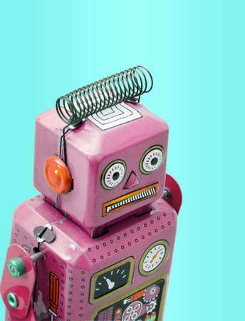 confused robot toy isolated on color の写真素材