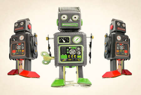  three black robot toys on white の写真素材