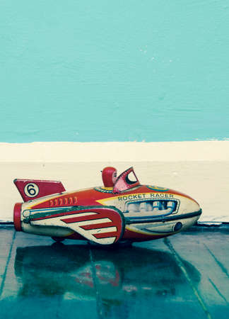 retro rocket toy on wooden floor  with reflection の写真素材