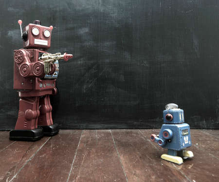 retro red robot techer at a blacboard with a ray gunの写真素材