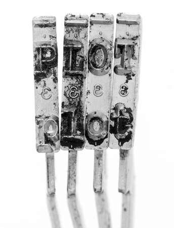 The word  PLOT with old typewriter hammers macro imageの写真素材