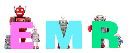 retro tin robot toys hold up the acronym  EMR solated on whiteの写真素材