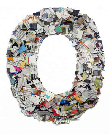 Letters made from newspaper capitel O isolated on whiteの写真素材
