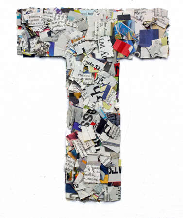 Letters made from newspaper capitel T isolated on whiteの写真素材