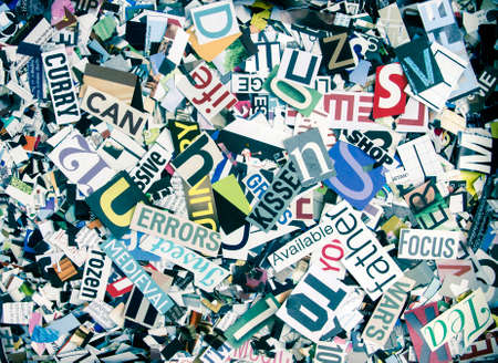 magazine confetti background random letters and words macroの写真素材