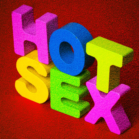 the words HOT SEX with wooden letters  and a glitter texture macro