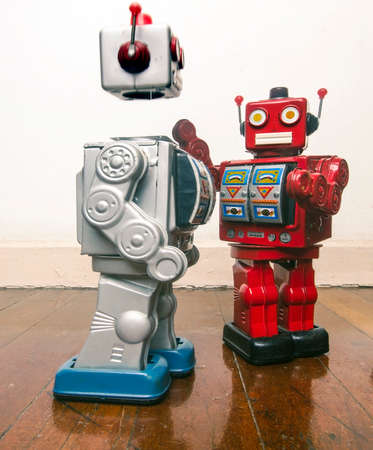 fight club robot concept on a wooden floorの写真素材