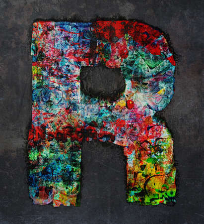 lots of small wooden letters to make up the letter A  graffiti style on a dark textured backgroundの写真素材