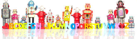 ABCDEFGH . wooden letter alaphabet with retro toy robotsの写真素材