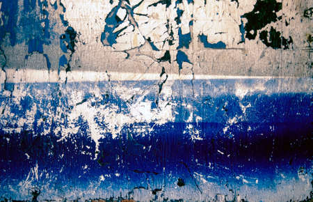old worn wood texture wut flaking blue paint and scratchedの写真素材