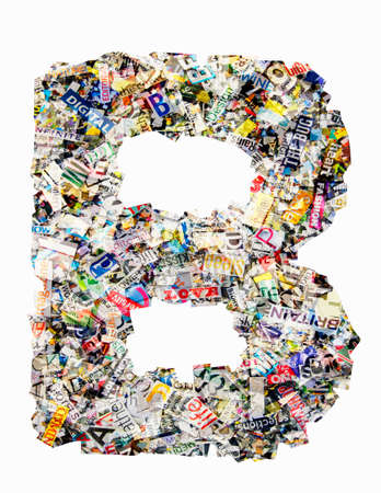 The letter B made from newspaper confettiの写真素材