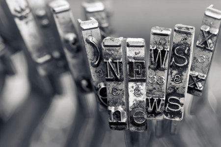 the word NEWS with old typwriter hammers macro image  monochrome image 