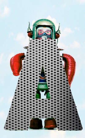 retro robots holding a big  metal letter A with blue sky and clouds の写真素材