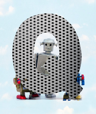 retro robots holding a big  metal letter Q with blue sky and cloudsの写真素材