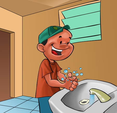 smiling boy washing his hands in a bath roomの写真素材