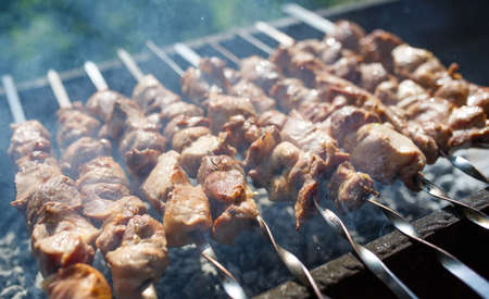 Cooking meat on the fire. Grilled charcoal.の写真素材