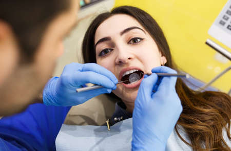 The patient caring for teeth in the dental clinicの写真素材