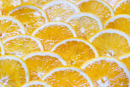 Background of orange ripe sweet slices