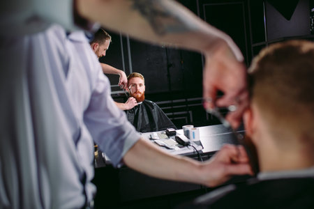 Confident man visiting hairstylist in barber shop.