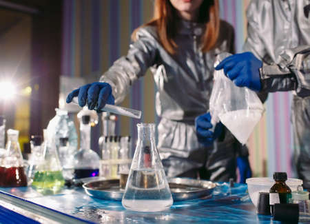 Chemists make drugs in the laboratory at homeの写真素材
