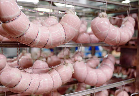 Making sausages, food production in the factory.の写真素材
