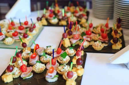 the buffet at the reception. Assortment of canapes.