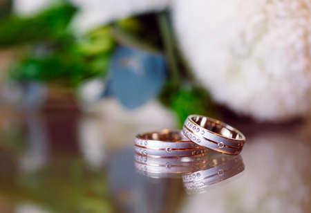 Wedding rings as a symbol of love and loyalty close up.の写真素材
