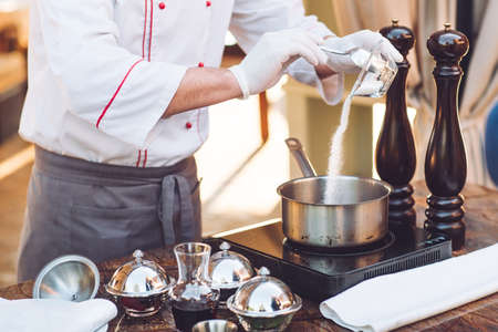 The chef prepares the Foie gras before the guests.の写真素材