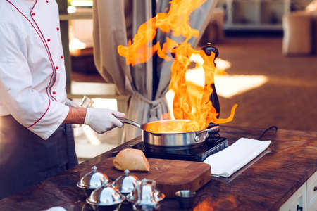 The chef prepares the Foie gras before the guests.の写真素材