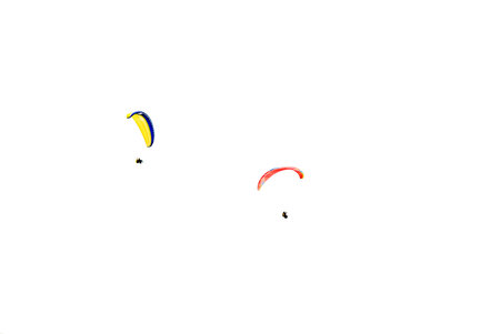Beautiful landscape with paragliders. Green mountains.