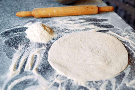 Knead the dough with the ingredients.の写真素材