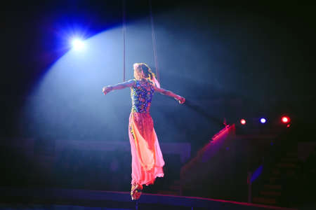 Performance of the girl aerial acrobat in the circus.の写真素材